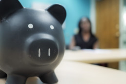Piggy bank at a tax clinic table.