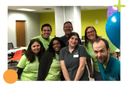 A smiling group of volunteers
